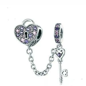 Crystal heart lock and key safety charm bead